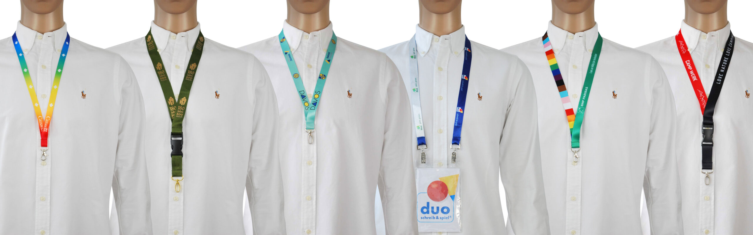 Six shirts with different lanyards hanging on white shirts, in various colours and designs.