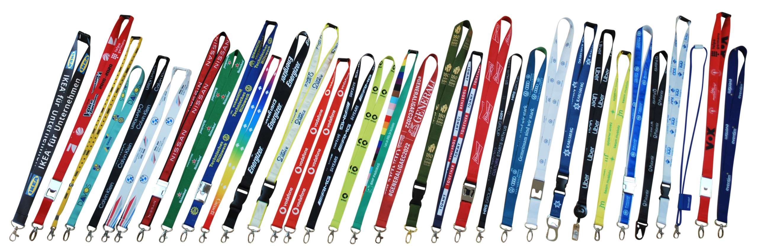 A row of colorful lanyards with various brand and event logos, arranged in a line.